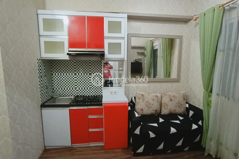 Kitchen 2BR Green Pramuka City Apartment at Middle Floor
