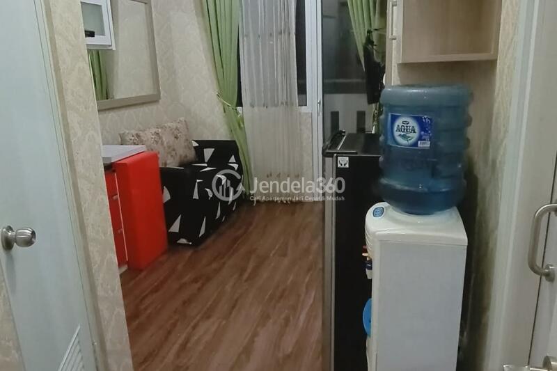 Living Room 2BR Green Pramuka City Apartment at Middle Floor