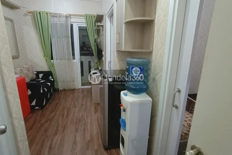 Living Room 2BR Green Pramuka City Apartment at Middle Floor