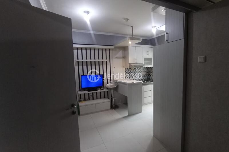 Living Room 1BR Green Pramuka City Apartment at Low Floor