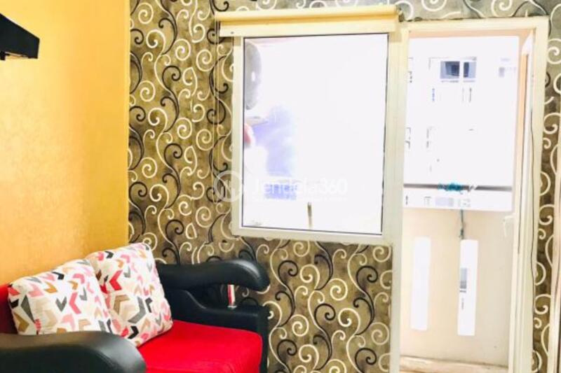 Living Room 2BR Green Pramuka City Apartment at Middle Floor