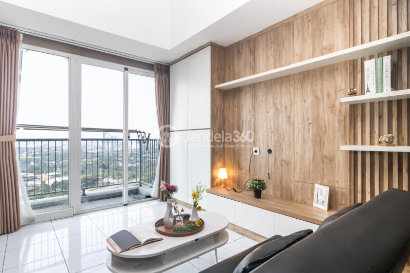 Living Room 1BR Apartment with city View at Casa De Parco Apartment