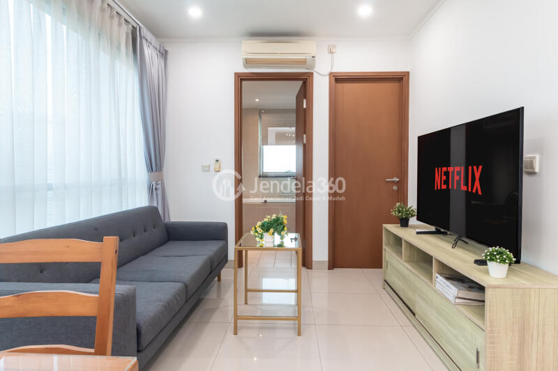 Living Room High Floor 2BR Apartment with City View at Sahid Sudirman Residence