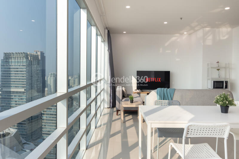Living Room High Floor 3BR Apartment with City View at Sahid Sudirman Residence