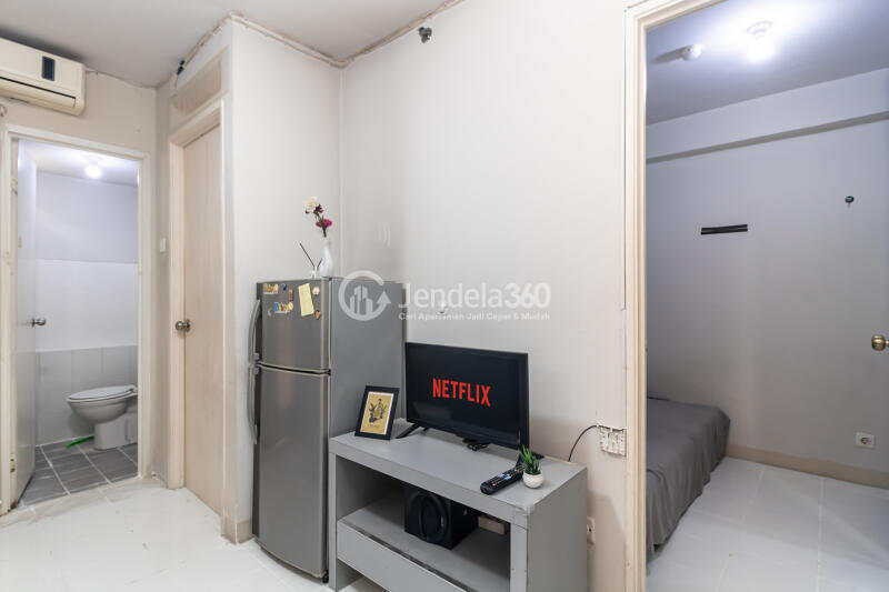 Living Room Trendy 2BR Apartment Low Floor with  View at Kalibata City Apartment