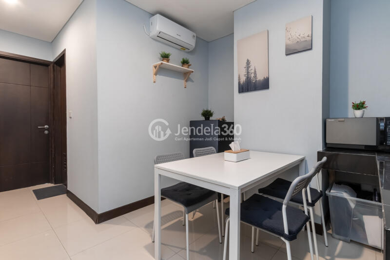 Living Room 1BR Apartment with City View at AKR Gallery West Residence