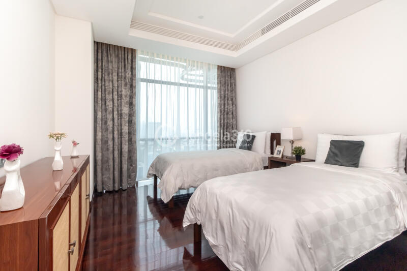 Bedroom 2 Simply Look 4BR Apartment Low Floor with City View at Shangri-La Residence