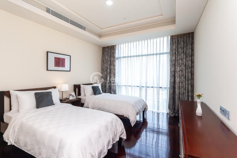Bedroom 2 2BR Apartment with City View at Shangri-La Residence