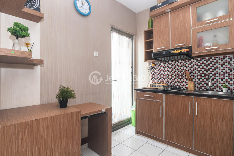 Kitchen Homey 2BR Apartment at Pancoran Riverside Apartment Low Floor