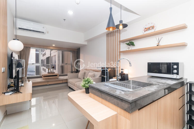 Kitchen 1BR Orange County Lippo Cikarang Apartment at Low Floor