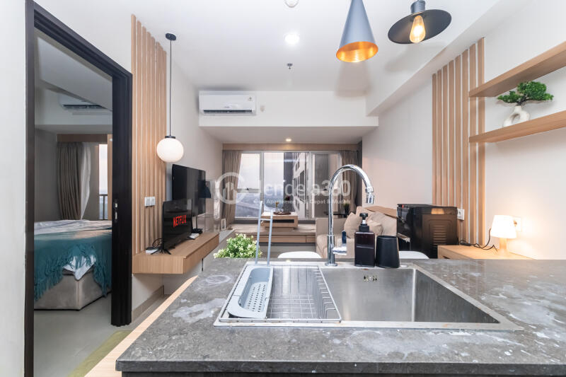 Kitchen 1BR Orange County Lippo Cikarang Apartment at Low Floor