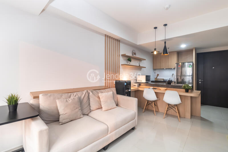 Living Room 1BR Orange County Lippo Cikarang Apartment at Low Floor