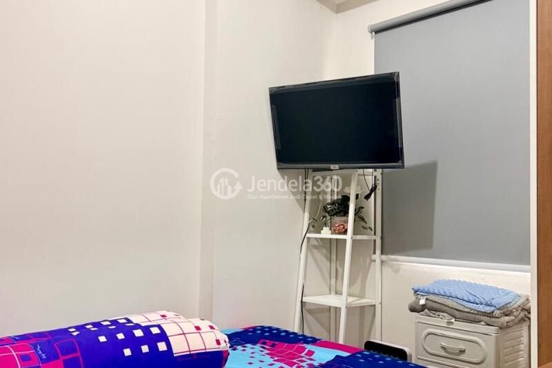 Bedroom 1 Comfortable 2BR Apartment Low Floor with city View at Serpong Green View Apartment