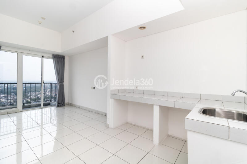 Kitchen 2BR Casa De Parco Apartment at Low Floor