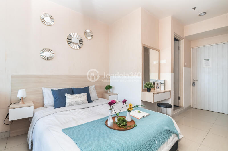 Bedroom High Floor Studio Apartment with City View at Grand Kamala Lagoon Apartment