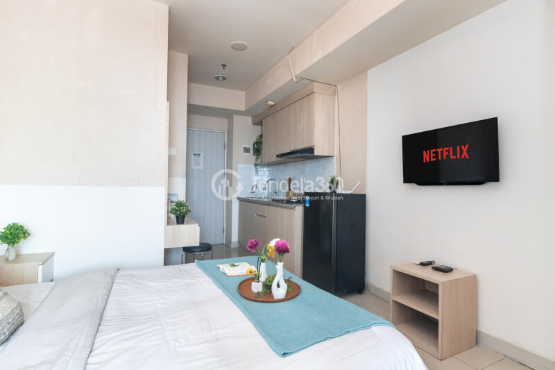 Bedroom High Floor Studio Apartment with City View at Grand Kamala Lagoon Apartment