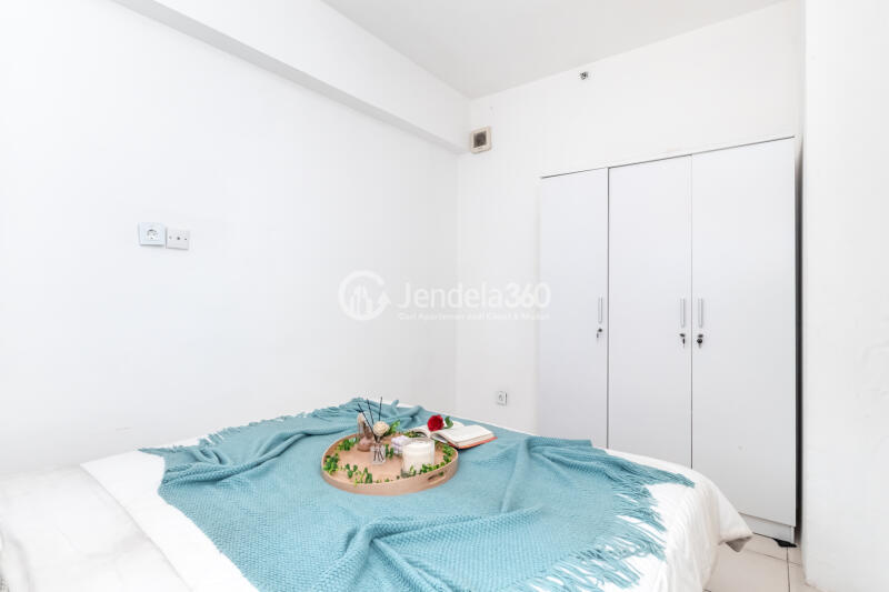 Bedroom 1 2BR Green Bay Pluit Apartment at Tower Borneo