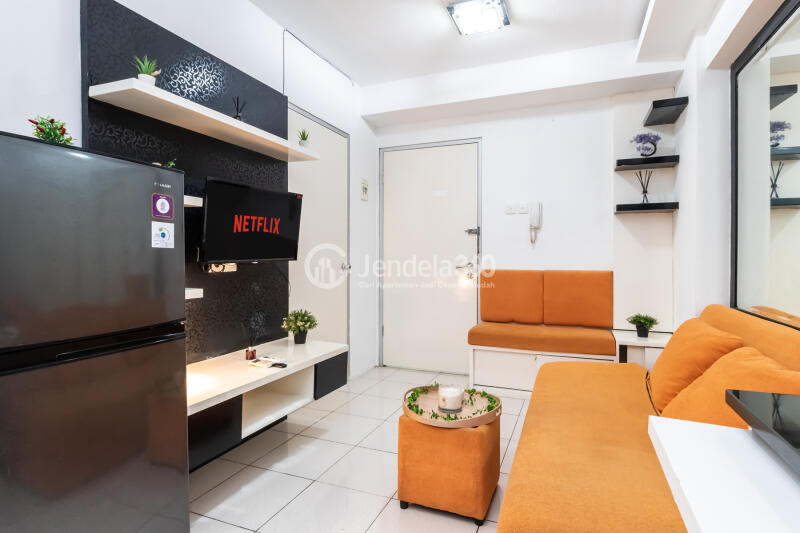 Living Room 2BR Green Bay Pluit Apartment at Tower Borneo