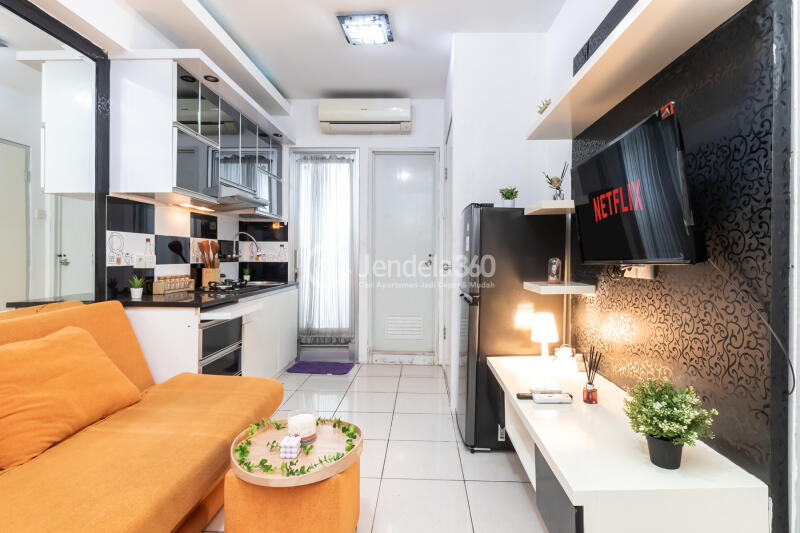 Living Room 2BR Green Bay Pluit Apartment at Tower Borneo