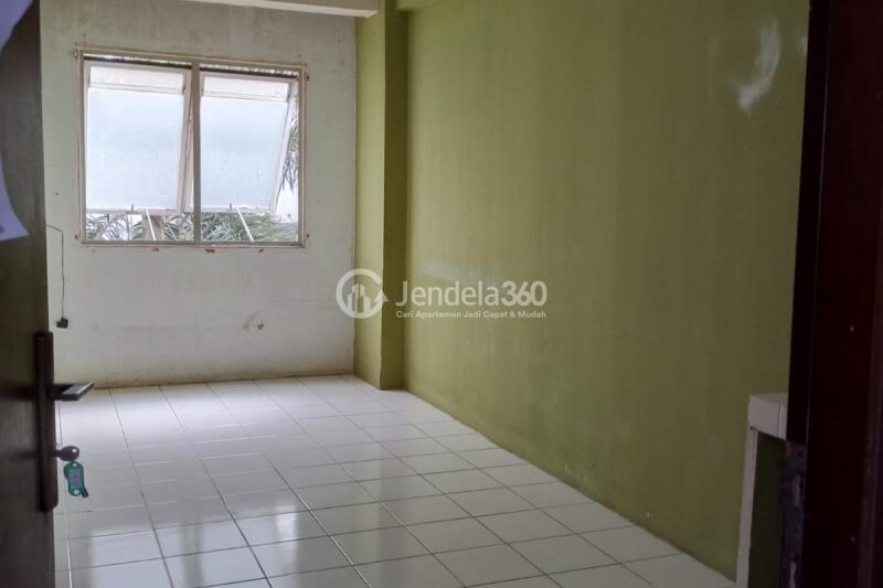 Bedroom 1 Low Floor 2BR Apartment with Garden View at City Park Apartment