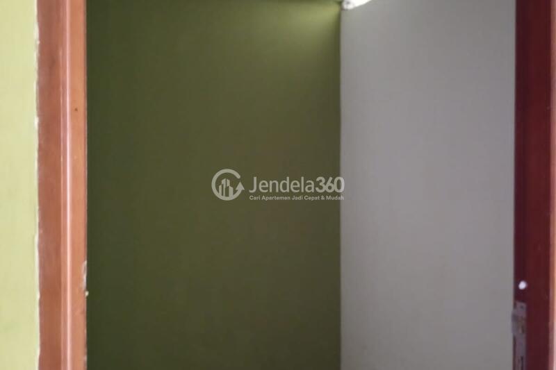 Bedroom 2 Low Floor 2BR Apartment with Garden View at City Park Apartment