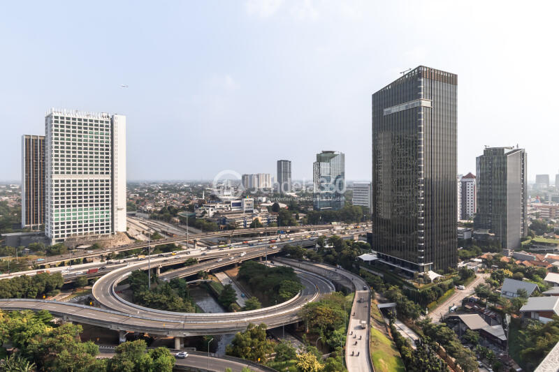 Balcony Decorative Studio Apartment Middle Floor with City View at Antasari Place Apartment