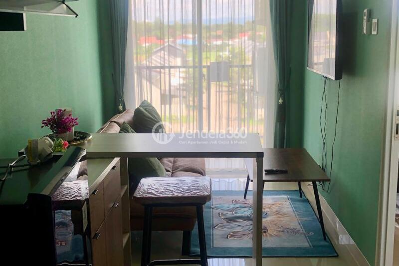 Living Room Low Floor 1BR Apartment with  View at Tamansari Skylounge Makassar Apartment