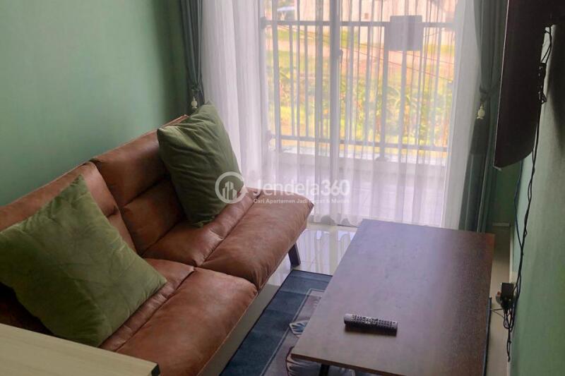 Living Room Low Floor 1BR Apartment with  View at Tamansari Skylounge Makassar Apartment