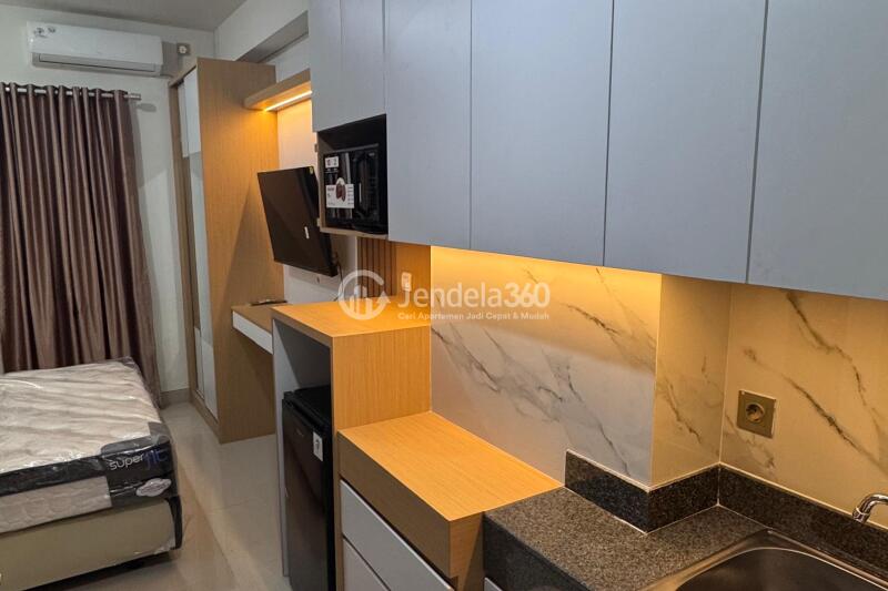 Kitchen Fancy Studio Apartment at Transpark Cibubur Apartment Low Floor