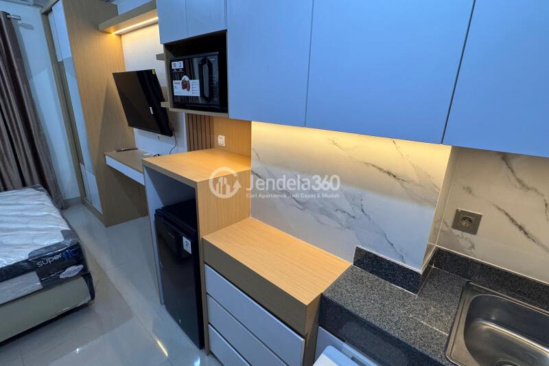 Kitchen Fancy Studio Apartment at Transpark Cibubur Apartment Low Floor