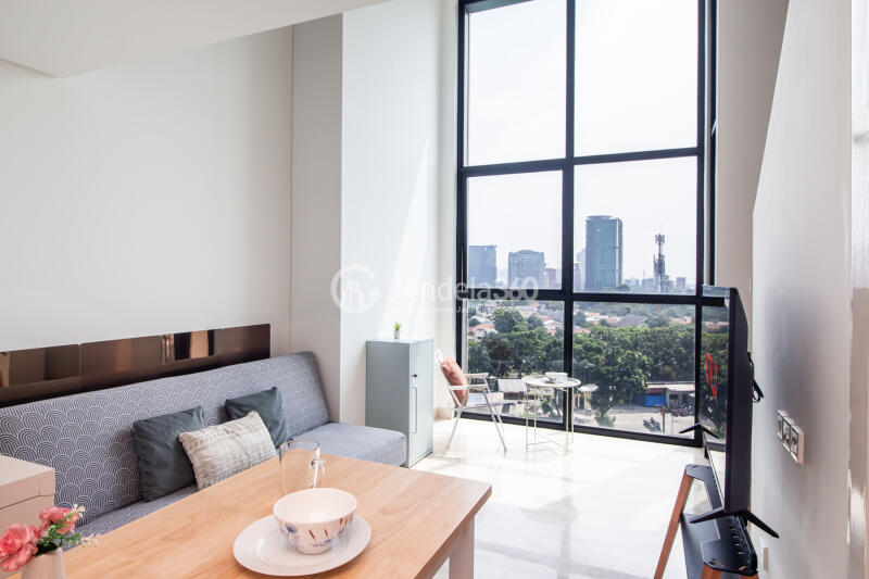 Living Room Studio Apartment with City View at Southgate Residence