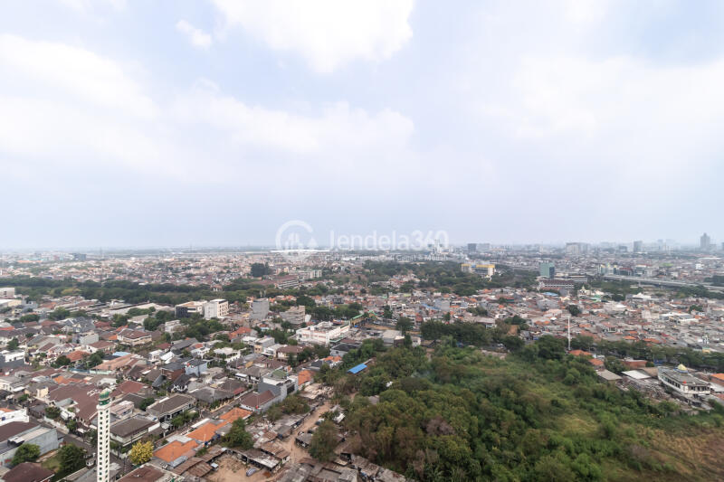 Balcony Elegant Studio Apartment High Floor with  View at Bassura City Apartment