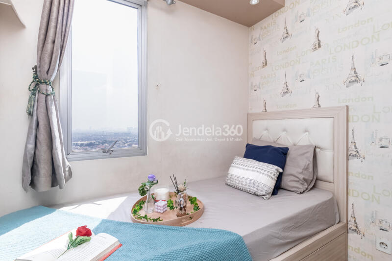 Bedroom 2 High Floor 3BR Apartment with city View at Bassura City Apartment