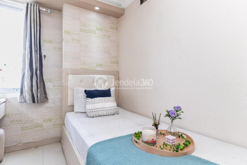Bedroom 2 High Floor 3BR Apartment with city View at Bassura City Apartment