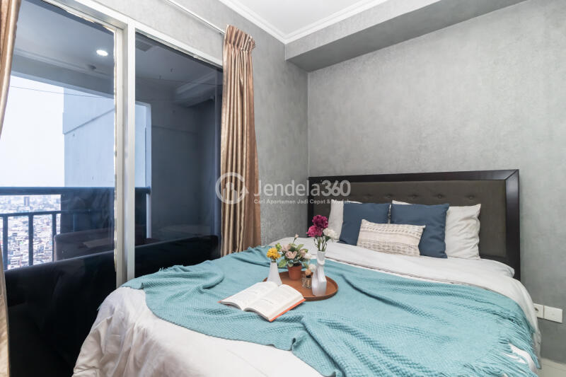 Bedroom 1 Homey 2BR Apartment High Floor with City View at Green Central City Apartment