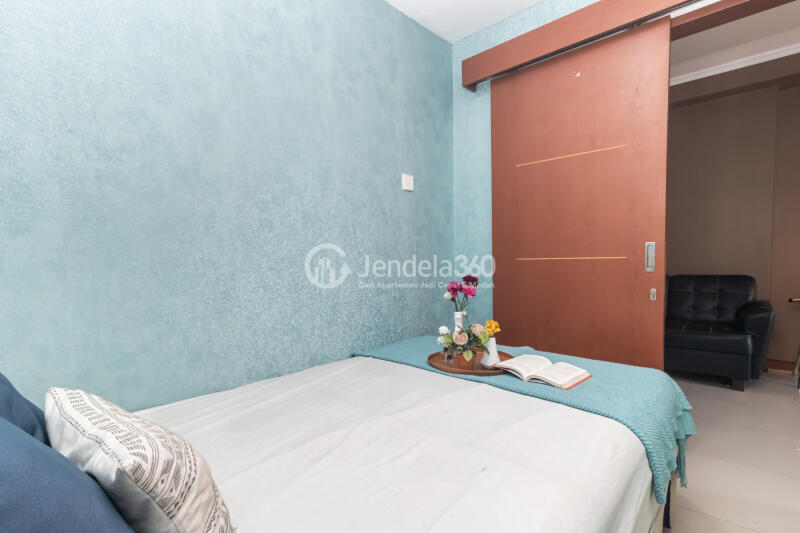 Bedroom 2 Homey 2BR Apartment High Floor with City View at Green Central City Apartment