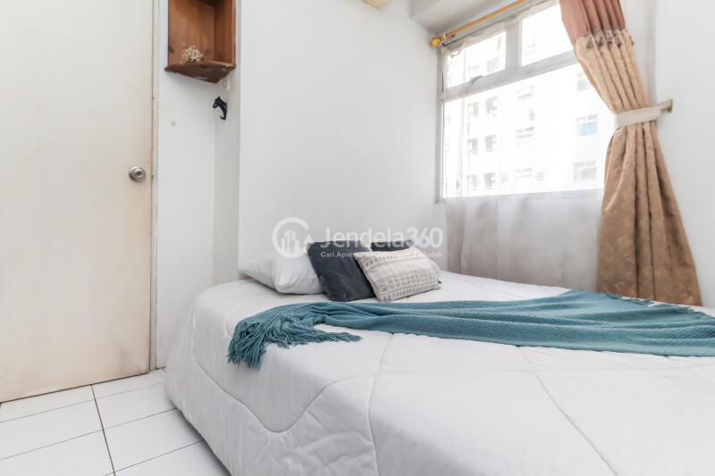Bedroom 1 2BR Apartment with City View at Kalibata City Apartment