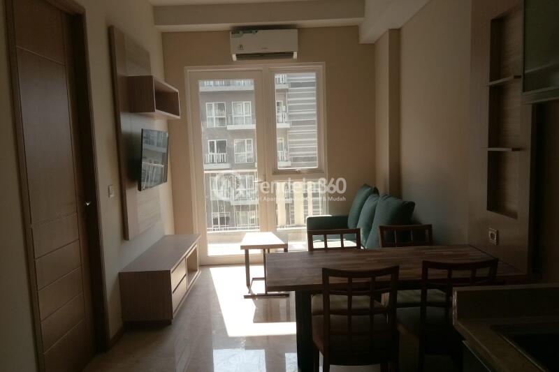 Living Room 1BR Apartment with  View at Grande Valore Condominium