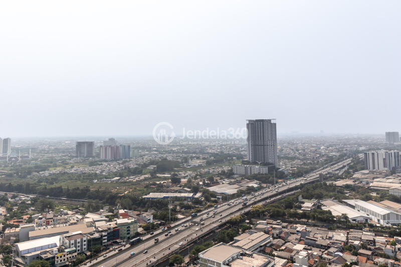 Balcony Peaceful 1BR Apartment at Puri Orchard Apartment Low Floor