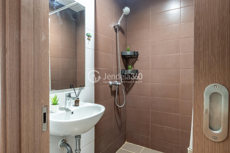 Bathroom Peaceful 1BR Apartment at Puri Orchard Apartment Low Floor