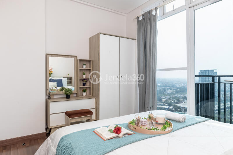 Bedroom Peaceful 1BR Apartment at Puri Orchard Apartment Low Floor