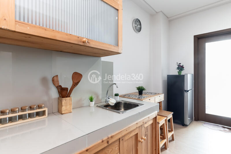 Kitchen Peaceful 1BR Apartment at Puri Orchard Apartment Low Floor