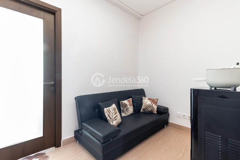 Living Room Peaceful 1BR Apartment at Puri Orchard Apartment Low Floor