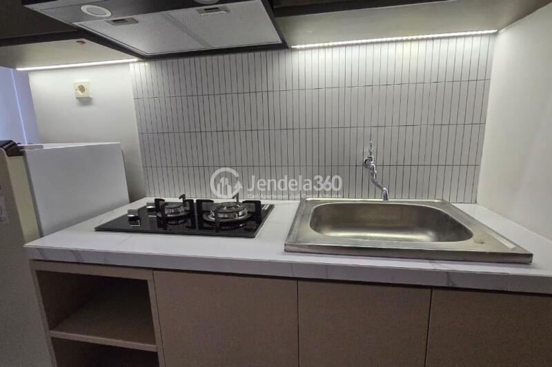 Kitchen Elegant Studio Apartment at Podomoro Golf View Apartment Middle Floor