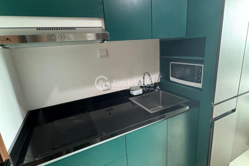 Kitchen Homey 1BR Apartment Low Floor with  View at Southgate Residence