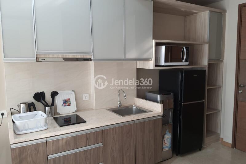 Kitchen 1BR Apartment with  View at Grande Valore Condominium
