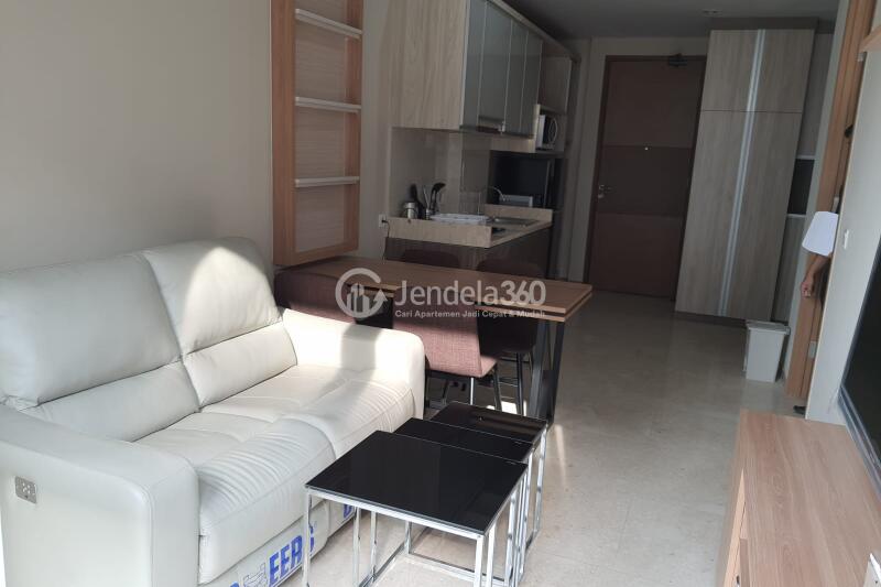 Living Room 1BR Apartment with  View at Grande Valore Condominium
