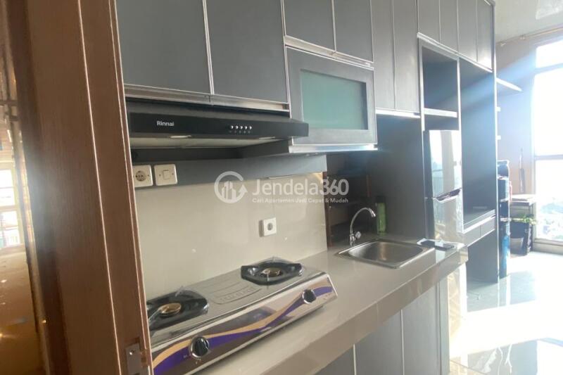 Kitchen Well Located Studio Apartment at Puri Orchard Apartment High Floor