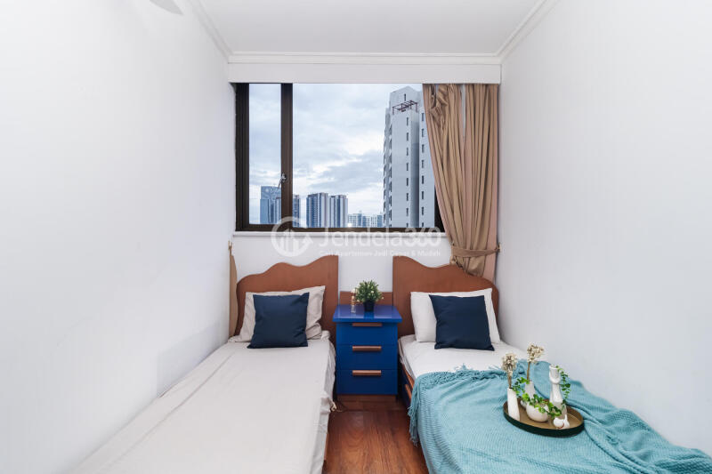 Bedroom 2 Stylish 2BR Apartment Low Floor with City View at Taman Rasuna Apartment