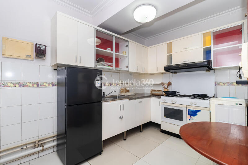 Kitchen Stylish 2BR Apartment Low Floor with City View at Taman Rasuna Apartment